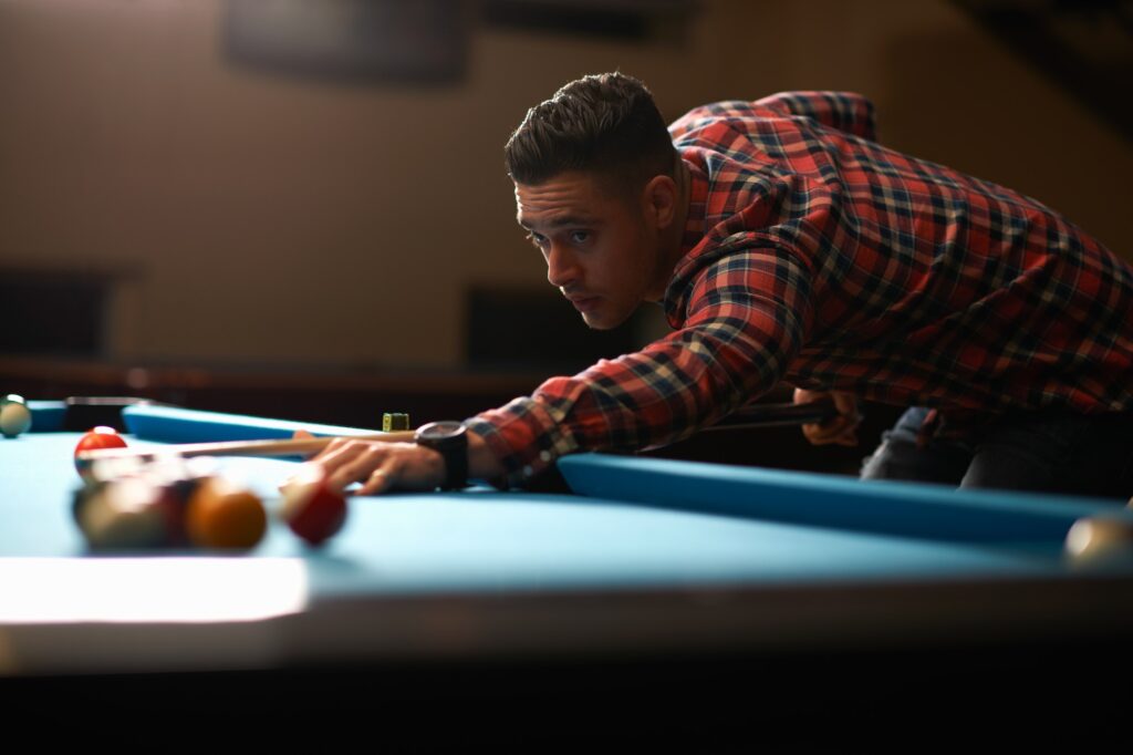 Man playing pool in club